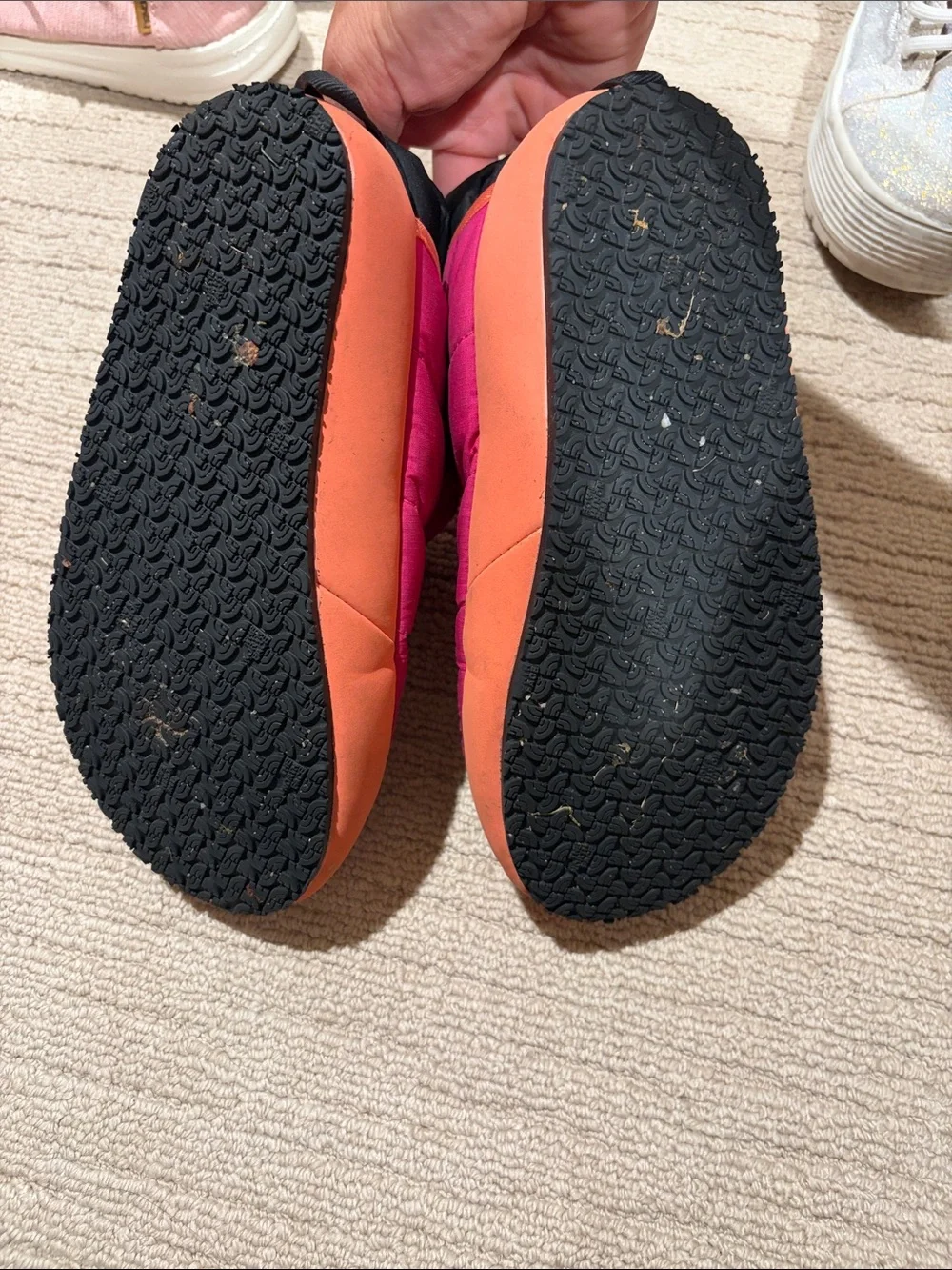 The North Face Kids Pink and Orange Puffy Slip-On Slippers